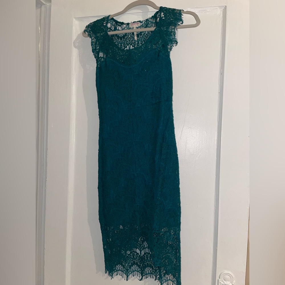 Teal crochet dress.